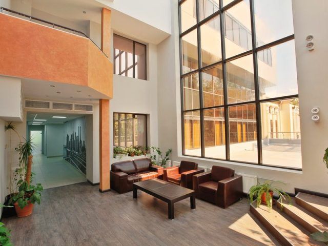 Office lobby where a CPR training kiosk supports workplace safety